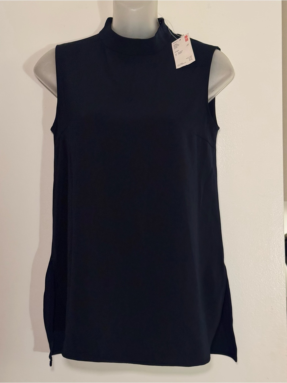 New Uniqlo High Neck Sleeveless Blouse. This top is Navy and size XS.